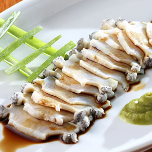 Finely sliced abalone sashimi
